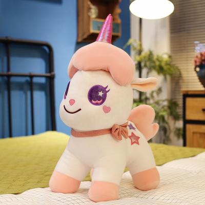 China Wholesale Plush Custom Stuffed Unicorn Plush Toys Holding Magical Unicorn for sale