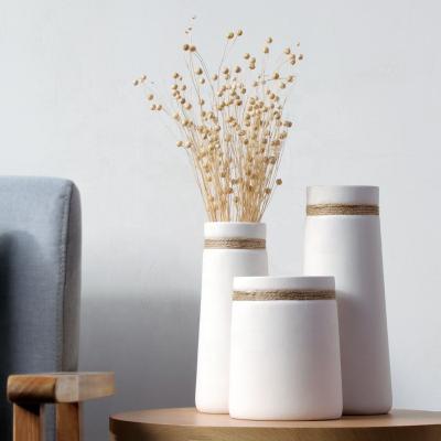 China Modern simple minimalist vase creative white rope decoration home living room art Japanese ceramic flower vase for sale