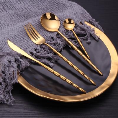 China Sustainable Western Dinnerware With Handle 304 Stainless Steel Mirror Cutlery Golden Spiral Steak Dinnerware for sale