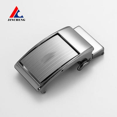 China Zinc alloy custom made men's belt logo alloy head belt accessories automatic belt buckle for sale