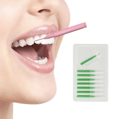 China Cleans Teeth Care Oral Plant 0.6mm Disposable Cleaning Interdental Brushes For Adult for sale