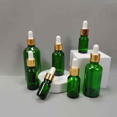 China Wholesale 5ml 10ml 15ml 20ml 30ml 50ml 100ml Oil Oil Amber Glass Bottle With Black Luxury Cosmetic Caps for sale