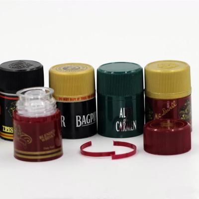 China Offset Printing Plastic Ring Whisky Bottle Caps Tamper Evident Liquor Bottle Closures for sale