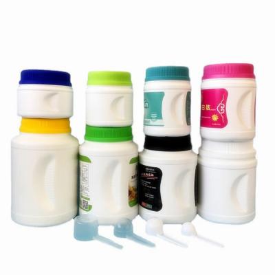 China 1500ml Lightweight Round Plastic Powder Canister Protein Powder Bottle With Lid for sale