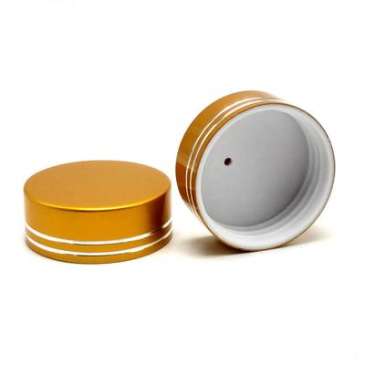 China Non Spill Round Plastic Bottles Caps Metalized Glossy Elegant Cosmetic Closure 45mm for sale