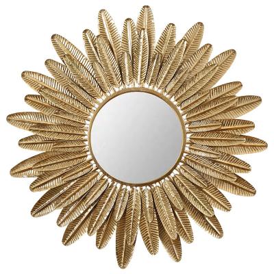 China Luxury Metal Iron Art Hollow Sun With Circular Mirror Home Decoration Leaf Frame Wall Mirror for sale