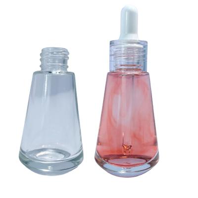 China 30ml cosmetic luxury serum cone shape glass dropper bottle for essential oils with packing box for sale