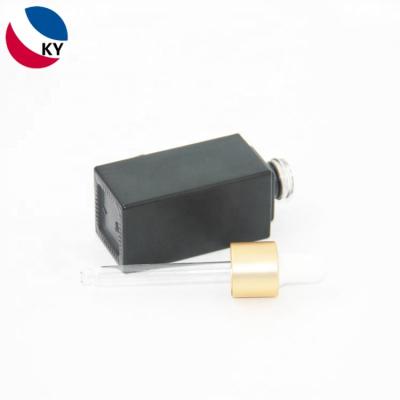 China Thick Bottom Black And Gold Square 30Ml Glass Dropper Bottle With Rubber Dropper Head for sale