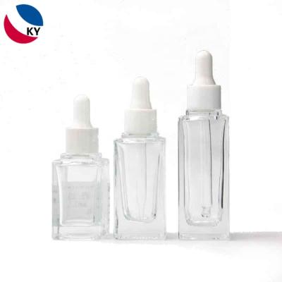 China 30ml 20ml 15ML Thick Bottom Dropper Lid Dropper Bottle Clear Glass White Serum Packaging With Dropper for sale