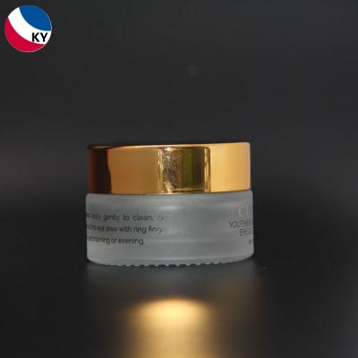 China 15g Glass Eye Cream Jar Cosmetic High Quality Round Lip Balm Glass Jar With Gold Aluminum Lid for sale