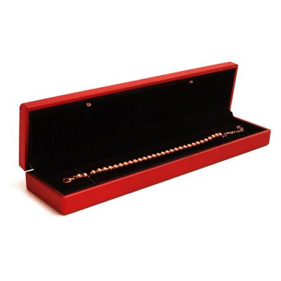 China Eco-friendly Luxury Red LED Light Jewelry Packaging Box Display With Pendant Bracelet Ring for sale