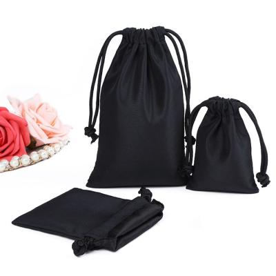 China Fashion Recyclable Design Mini Black Organic Cotton Soft Drawstring Bags Pouches With Custom Logo for sale