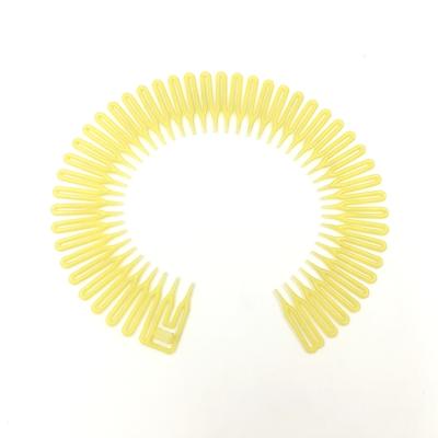 China Simple and easy to use popular flexible bulk hair comb wide plastic headband for sale