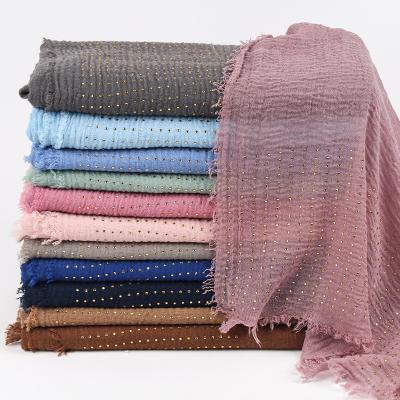 China Popular new sale exhaust wrap plain bubble cotton scarf/scarves fringes women pashmina hijaabs warm soft solid muslim scarves large for sale