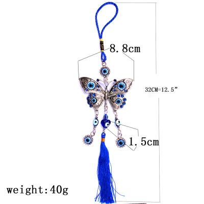 China Decorate 2021 Wholesale Jewelry Charm Evil Glass Eye Blue Eye Butterfly Car Ornaments Hanging Pendant for sale