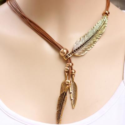 China Western Style Brown Ropes and Black Gold Feather Rope Ladies Sweater Chain Necklace and Silver Three Rope Feathers Big Small for sale