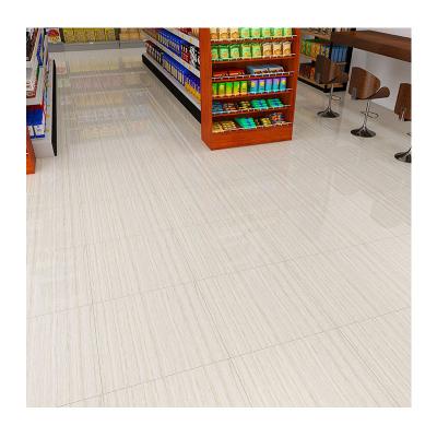 China Wear Resistant Luxury Italian Ceramic Tile 600x600 Beige Flooring Vitrified Polished Porcelain Onyx Marble Tiles for sale