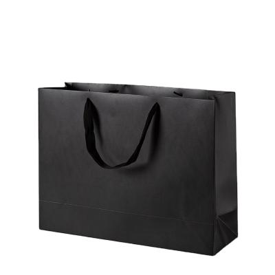 China Low Moq Matte Black Card Paper Gift Biodegradable Custom Paper Bag Kraft Paper Bag Clothing Shopping Bag With Ribbon Handle for sale