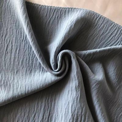 China Antistatic 100% Polyester Airflow Crepe Woven Fabric Plain Dyed Lightweight Suitable For Dresses And Shirts for sale