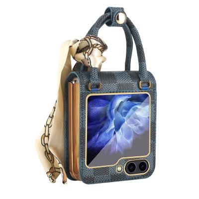 China QuanDe TPU Shockproof Soft PC Cell Phone Folding Hard Leather Case With Slik Strap For Samsung Galaxy Z Flip 5 4 3 5G for sale