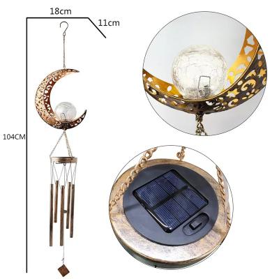 China Retro Modern Outdoor Waterproof Solar Power Wind Chime Lamp New Moon Garden Lawn Landscape Iron Projection Lamp for sale