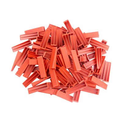 China Modern Inserting Piece Trim Setting And Seaming Red Wedges Ceramic Tile Leveler Adjustment And Leveling Tiling Tool for sale