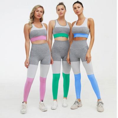 China Yoga Patchwork OEM 2 Pcs Seamless Breathable Tricolor Women Sports Bra And Leggings Suit Yoga Sets Fitness And Yoga Wear for sale