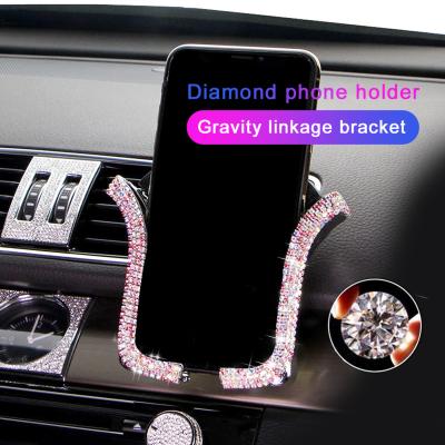 China Car Phone Holder Air Vent Mount Clip Mobile Universal Cell Crystal Rhinestone Phone Holder for sale