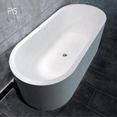 China Eco-Friendly Modern Solid Surface Free Standing Bathtubs PG Caststone Stand Alone Oval Bathtub Composite Resin Bathroom Bathtub Hot Tub for sale