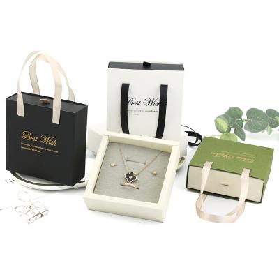 China Jewelry/Earrings/Rings/Giftbox Portable String Jewelry Drawer Box Ribbon Handle Packaging Ring Earring Necklace Bracelet Bead Cardboard Paper Pendant/Necklace Packaging/Chain Bracelet/Bead Bracelet for sale