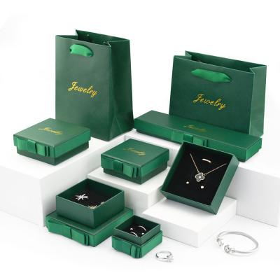 China Customized Exquisite Rigid Cardboard Jewelry Logo Packaging Gift Box Jewelry Lid/Earring/Ring/Pendant/Necklace/Bracelet Chain/Anklet/Hairpin & Bass Box With Bow-knot and insert for sale