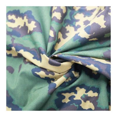 China Shrink-Resistant Cotton Woodland Polyester Camouflage Fabric Military Textile Fabric for sale