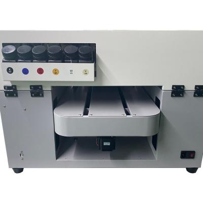 China Durable 2021 New A3 Size Desktop UV Flatbed Printer for DTF UV Printing for sale