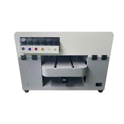 China Wholesale Price Durable Color CMYK White+Varnish Small A3 Desktop UV Flatbed Printer For Printing Shops for sale