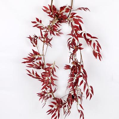 China Silk Vines Willow Leaves Garlands Hanging Wedding Eco-Friendly Holiday Decor for sale