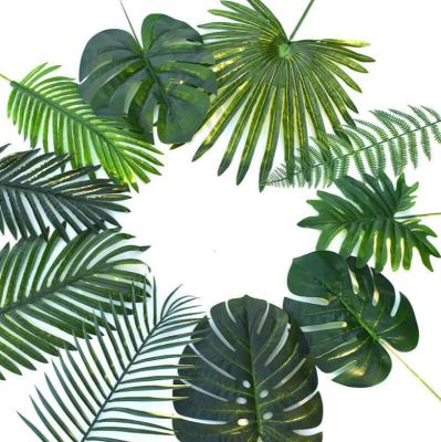 China Monstera Artificial Tropical Leaves Palm Tree Leaf Faux Decoration Palm Home Decor for sale