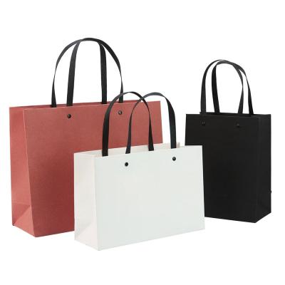 China Recycled Materials Paper Custom Logo Luxury Shopping Bag Gift Bag for sale