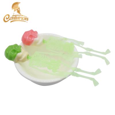 China Halloween Noctilucence Normal Human Skull Skeleton Candy Toy Lollipop Chinese Florestal Skull Hard Candy for sale