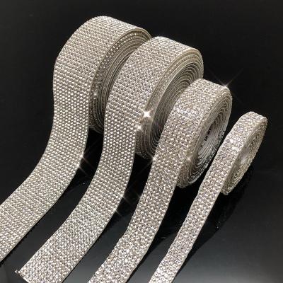 China Flatback ZSY Manufacturers Back Glue Rhinestone Mesh With Hot Melt Self Adhesive Hot Drill Tape Garment Decoration for sale