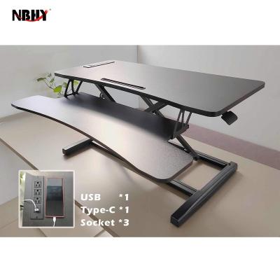 China Height Adjustable Workstation Sit To Stand Manual Pneumatic Riser Office Home Standing Desk Converter for sale