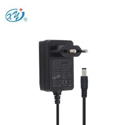 China Xing high quality 9v yuan 12v 24v 1a 2a 3a led adapter 12v power supply for strip light atmosphere lamp XY12LF-120100VH-EW for sale