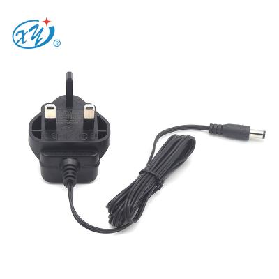 China UK LED Light 5V 9V 12V 24V 0.5A 1A 1.2A UK AC DC Power Adapter Wall Plug AC DC Power Supply For Led Strips for sale