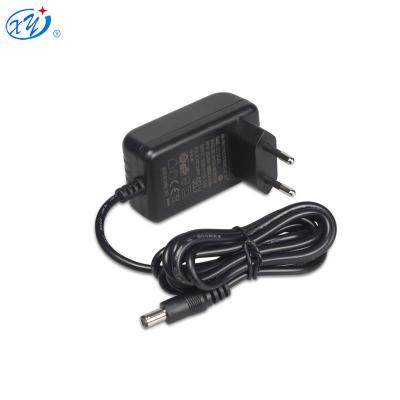 China UK Wall Mount EU Plug 10V 12v 1a 1.3A AC DC Adapter Led Driver Power Supply For Led Strip Light XY13LA-100130VH-EW for sale