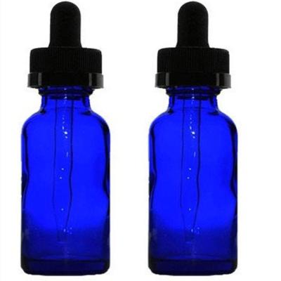 China Wholesale Cobalt Blue Cosmetic Boston Round Bottle With Child Resistant Cap Glass Dropper for sale