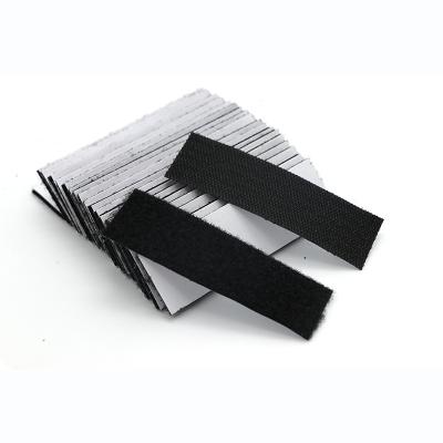 China 38mm White Back Glue Self Adhesive Hook And Loop Tie Downs Strips Cable Ties Viable For Sofa Windows Screen en venta