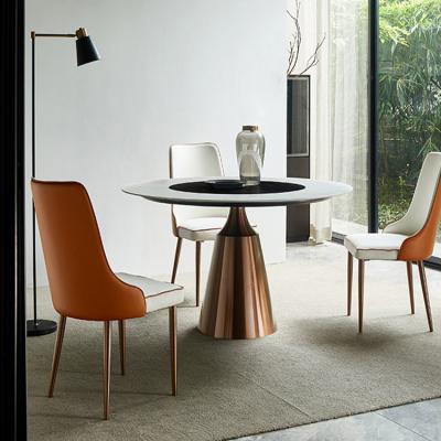 China Customizable Italian Rose Gold Stainless Steel Revolving Leg Dining Table Sintered Stone Revolving Round Dining Table For Dining Room for sale