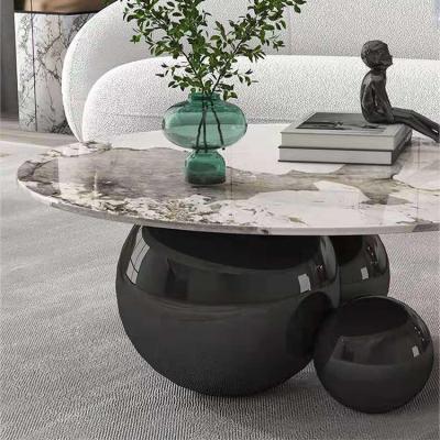 China The other luxury fashion gold creative ball design metal living room center table round agglomerated stone coffee table for sale