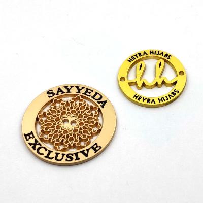 China Viable Wholesale Custom Brand Metal Logo Tag Clothing Sewing Metal Labels For Fabric for sale