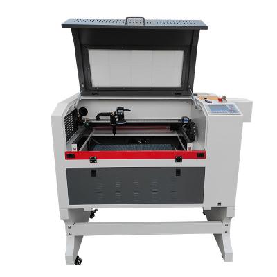 China CCD Camera 9060 CO2 Laser Engraving Machine For Garment Fabric Acrylic Wood for sale