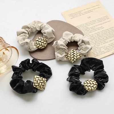 China Wholesale Custom Scrunchies PU Hair Scrunchies Women Accessories Fabric Elastic Hair Band Hair Ties Girls Friendly Material for sale